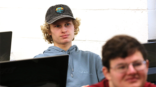 Image: student in computer lab classroom